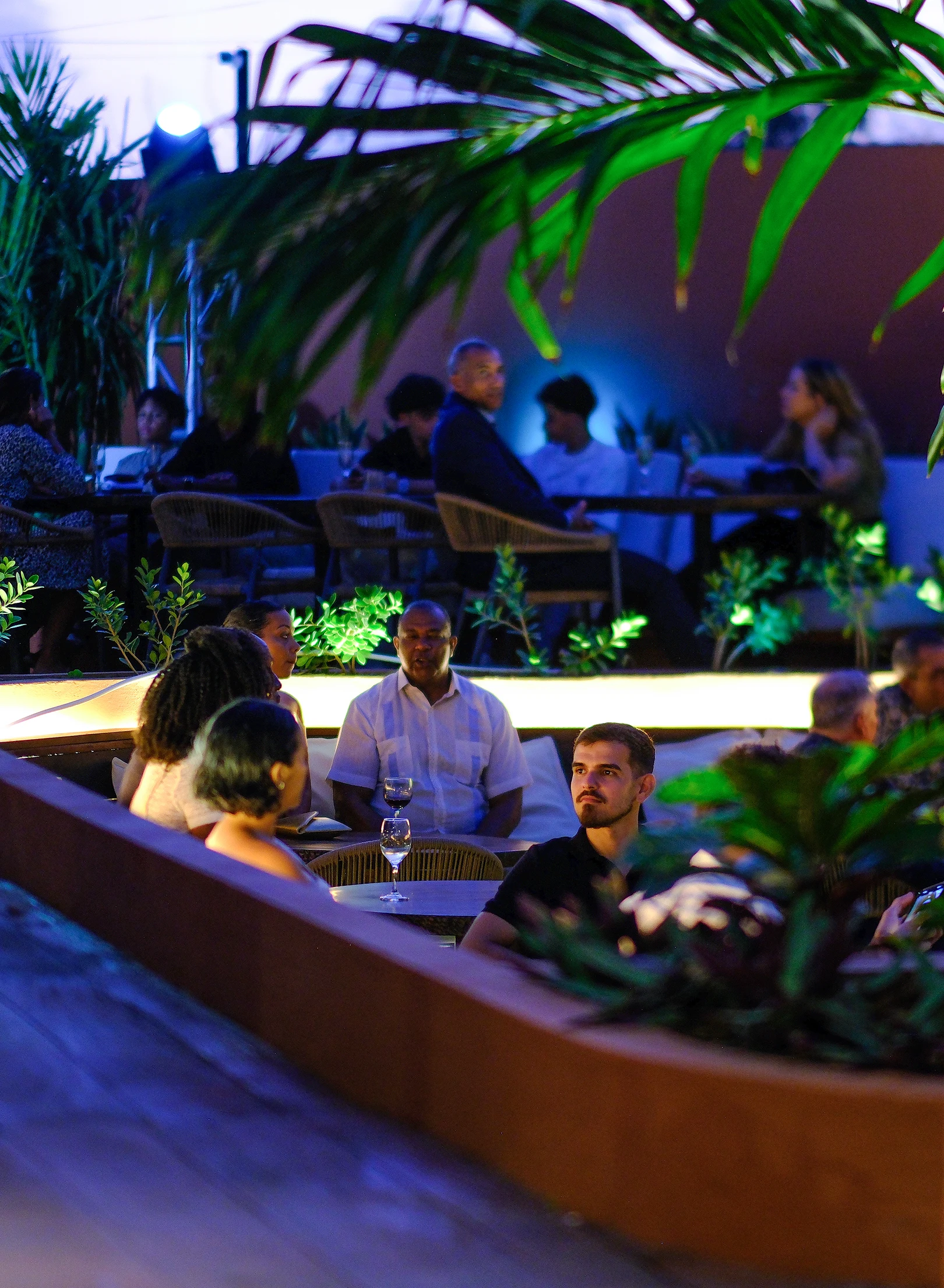 Romantic evening dinner in a garden restaurant